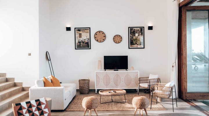 A living room filled with furniture and a tv